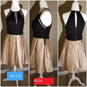 Brand new gold and black dress